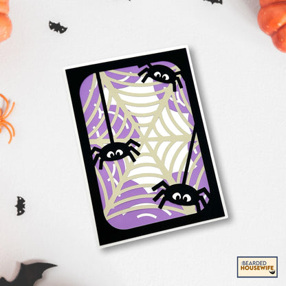 cluster of spiders layered card